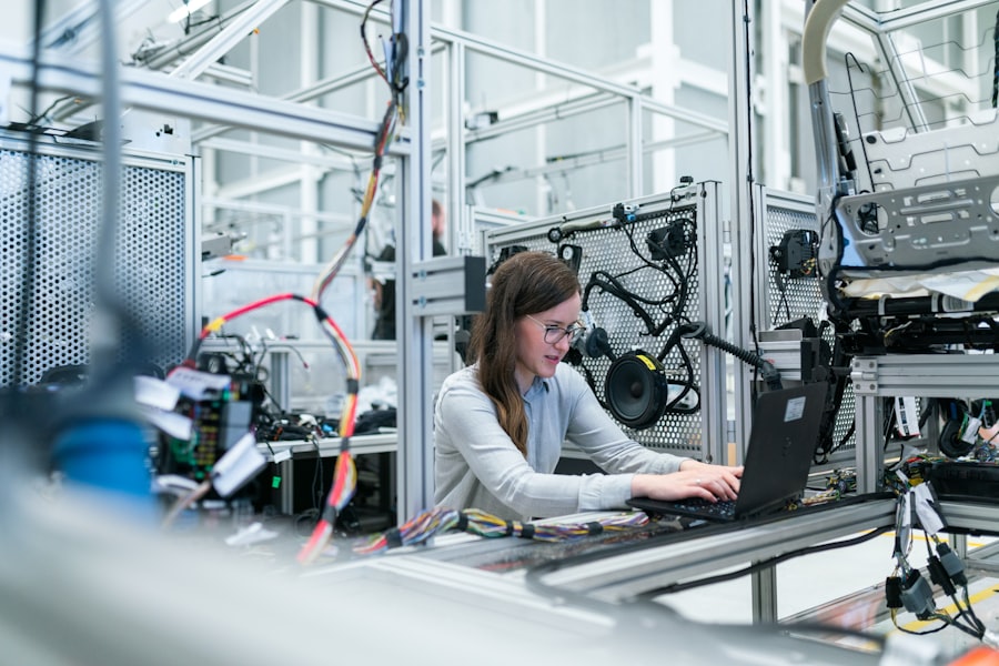 Engineer working at a manufacturing assembly station