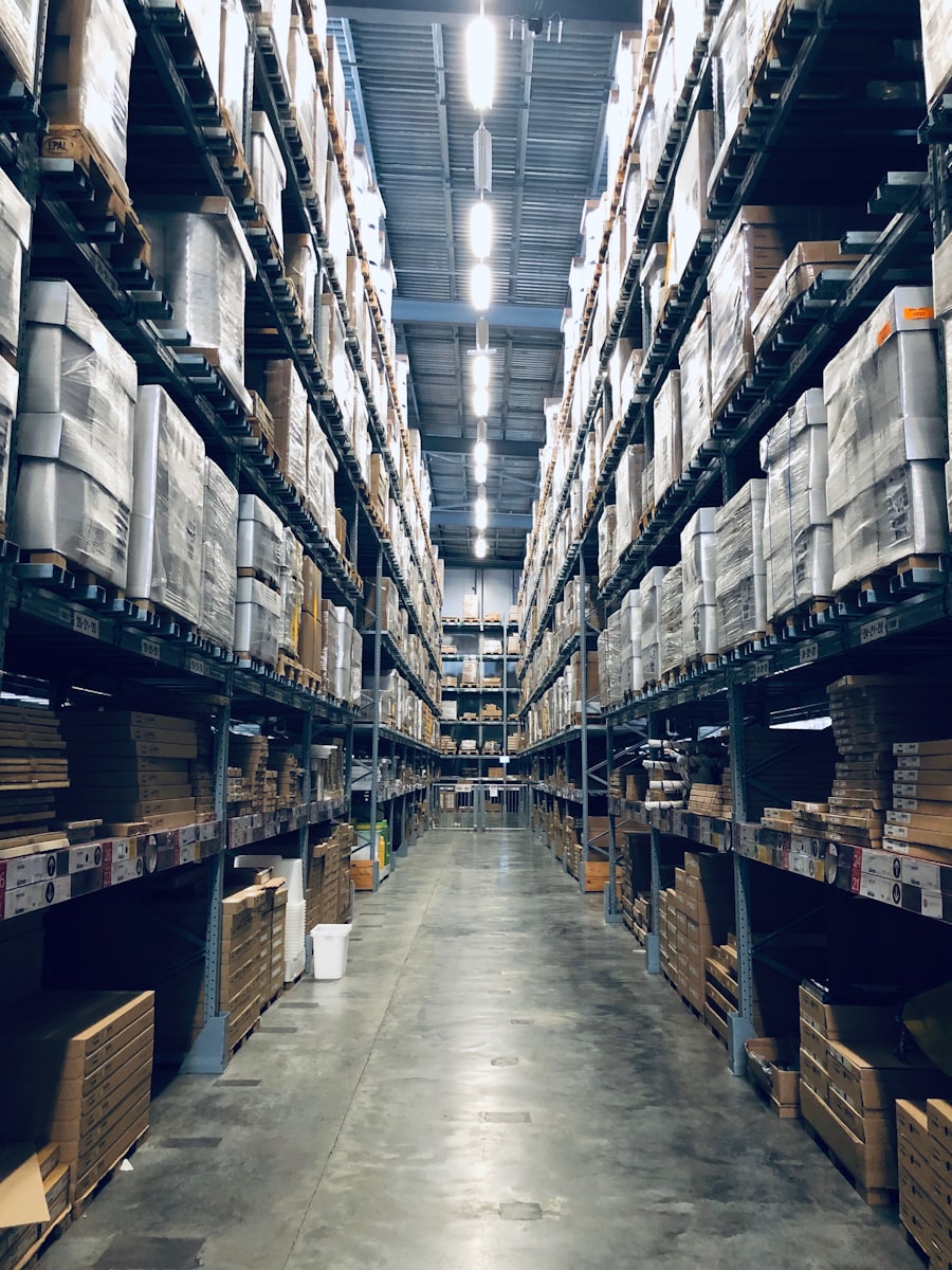 High-bay warehouse aisle with stocked pallet racking